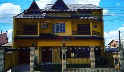 Casa com 4 dormitórios à venda, 400 m² por R$ 1.200.000,00 - Moinhos de Vento - Canoas/RS