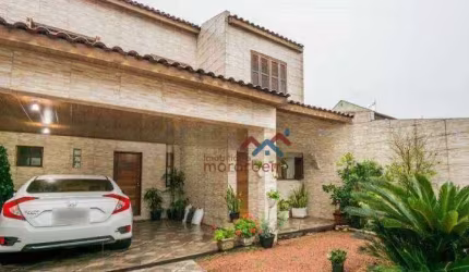 Sobrado com piscina e 4 dormitórios à venda, 164m² por R$ 636.000,00 - Igara - Canoas/RS
