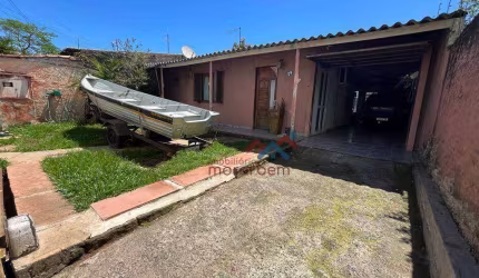 Casa com 2 dormitórios à venda, 80 m² por R$ 320.000,00 - Guajuviras - Canoas/RS