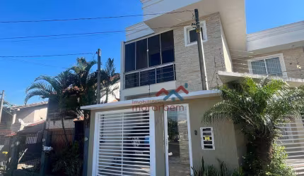 Casa com 3 dormitórios à venda, 132 m² por R$ 700.000,00 - Moinhos de Vento - Canoas/RS