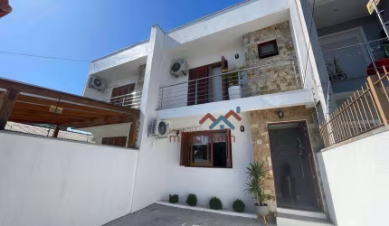 Casa com 3 dormitórios à venda, 110 m² por R$ 585.000,00 - São José - Canoas/RS