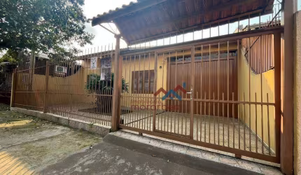 Casa com 2 dormitórios à venda, 103 m² por R$ 329.000,00 - Guajuviras - Canoas/RS