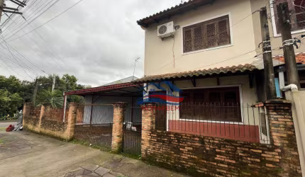 Casa com 2 dormitórios à venda, 80 m² por R$ 320.000 - Olaria - Canoas/RS