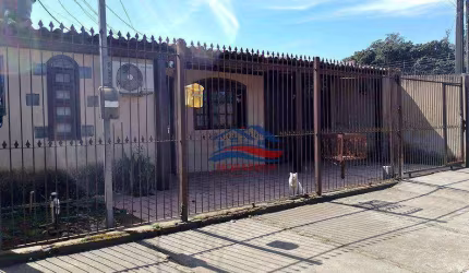 Casa com 3 dormitórios à venda, 130 m² por R$ 424.500,00 - Guajuviras - Canoas/RS