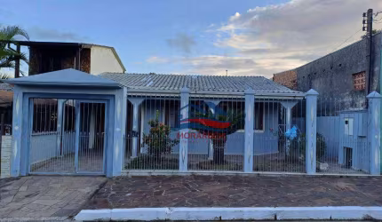 Casa com 2 dormitórios à venda, 100 m² por R$ 318.000,00 - Guajuviras - Canoas/RS