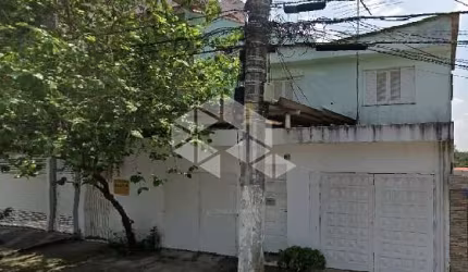 Terreno Baeta Neves venda, com renda de casas alugadas