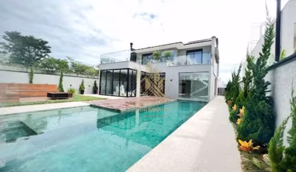 Casa com 4 dormitórios à venda, 405 m² por R$ 4.950.000,00 - Condominio Figueira Garden - Atibaia/SP