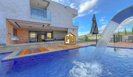 Casa com 6 dormitórios, 680 m² - venda por R$ 8.500.000,00 ou aluguel por R$ 33.276,00/mês - Condominio Figueira Garden - Atibaia/SP