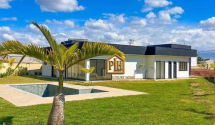 CASA TÉRREA COM 4 SUITES À VENDA NO CONDOMÍNIO SHAMBALA III EM ATIBAIA