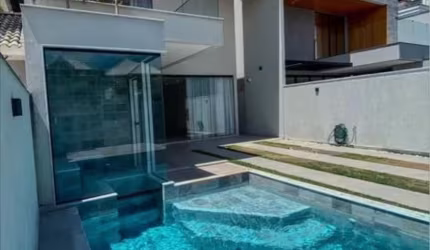 Casa moderna de 350M² com design contemporâneo no condomínio Green Place.