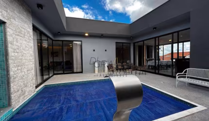 Casa com 4 dormitórios à venda, 387 m² por R$ 2.500.000,00 - Campos Elíseos - Varginha/MG