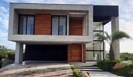 Viva o Luxo e Conforto em 452m² de Puro Requinte: 4 Suítes e Área de Lazer Completa