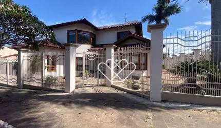 Elegância e Conforto: Casa com Piscina e Churrasqueira no Centro de Gravataí!