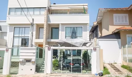 Encante-se com Esta Casa de Alto Padrão no Bairro Reserva Dom Feliciano!