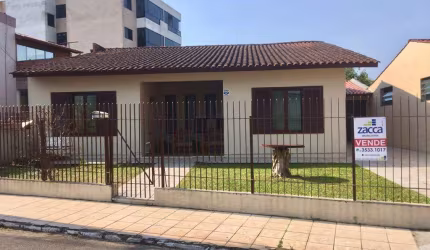 Casa para Venda em Sombrio, Centro, 3 dormitórios, 1 suíte, 2 banheiros, 2 vagas