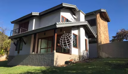 Casa com 3 dormitórios à venda, 290 m² por R$ 3.200.000,00 - Condomínio Flamboyant - Atibaia/SP