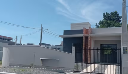 Casa geminada em Itajuba: 2 dormitórios e quintal espaçoso!