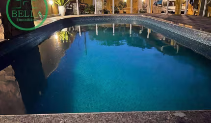 Casa com 2 dormitórios à venda, 130 m² por R$ 636.000,00 - Solemar - Praia Grande/SP