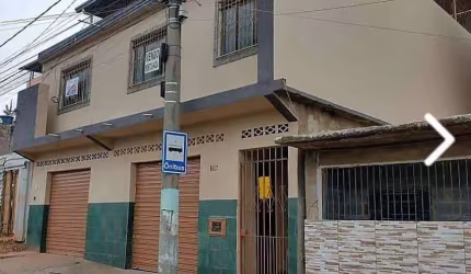 Excelente casa com 3 quartos, 2 garagens, quintal, e terraço no Santa Cruz.