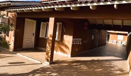 EXCELENTE CASA COM PISCINA E 3 DORMITORIOS