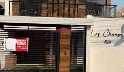 Casa com 3 quartos à venda na Rua Theóphilo Mansur, 864, Novo Mundo, Curitiba por R$ 684.652