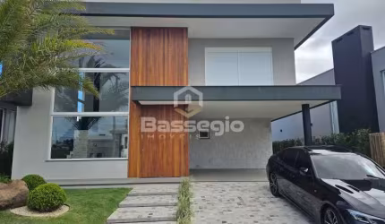 CASA DE LUXO EM CONDOMÍNIO FECHADO COM 4 SUÍTE
