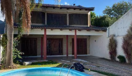 Sobrado com 3 dormitórios para alugar, 250 m² por R$ 6.750,00/mês - Dom Feliciano - Gravataí/RS