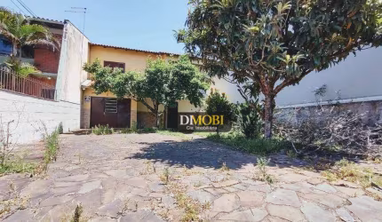 Sobrado com 4 dormitórios para alugar, 155 m² por R$ 3.270,00/mês - Centro - Gravataí/RS