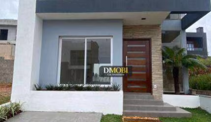 Sobrado com 3 dormitórios à venda, 147 m² por R$ 850.000,00 - Condomínio Primavera - Gravataí/RS