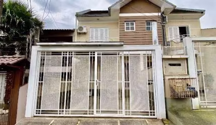 Sobrado com 4 dormitórios à venda, 170 m² por R$ 399.000,00 - Bela Vista - Gravataí/RS