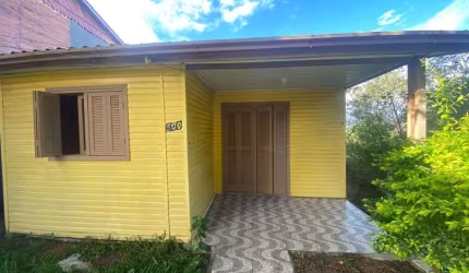 Casa com 2 dormitórios para alugar, 80 m² por R$ 1.550,00/mês - Auxiliadora - Gravataí/RS