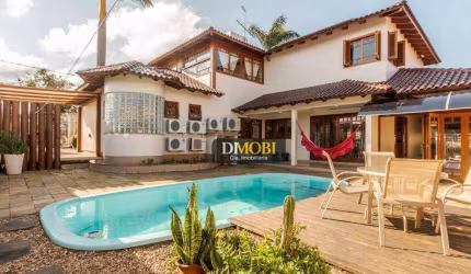 Sobrado com 4 dormitórios para alugar, 427 m² por R$ 12.550,00/mês - Centro - Gravataí/RS