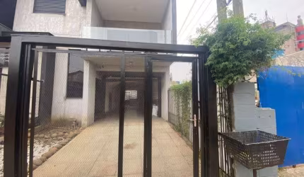 Sobrado com 3 dormitórios para alugar, 239 m² por R$ 4.705,00/mês - Salgado Filho - Gravataí/RS