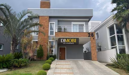 Sobrado com 3 dormitórios para alugar, 250 m² por R$ 17.080,00/mês - Alphaville - Gravataí/RS