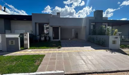 Casa com 3 dormitórios à venda, 120 m² por R$ 829.000 - Reserva do Arvoredo - Gravataí/RS