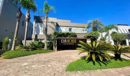 Sobrado com 3 dormitórios para alugar, 393 m² por R$ 25.428,52/mês - Alphaville - Gravataí/RS