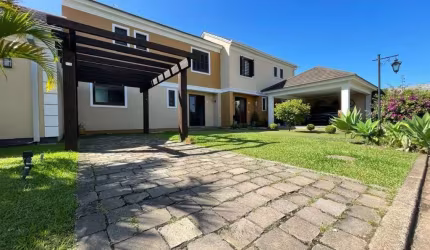 Sobrado com 3 dormitórios para alugar, 107 m² por R$ 4.691,00/mês - Reserva do Arvoredo - Gravataí/RS