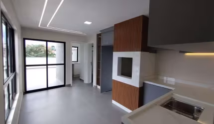 Apartamento duplex novo com móveis planejados, 3 quartos, churrasqueira e 2 vagas de garagem cobert