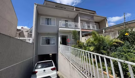 Casa com 4 quartos à venda no Xaxim, Curitiba  por R$ 1.200.000
