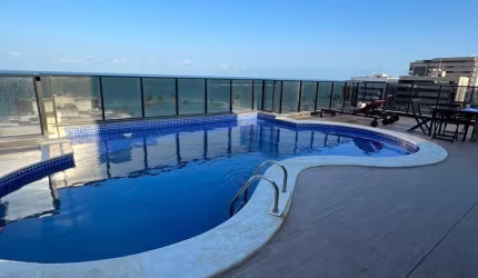Aconchegante quarto e sala uma rua atrás da orla