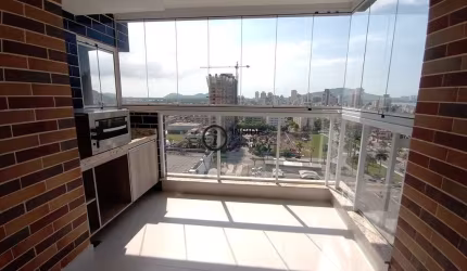 Apartamento em prédio com lazer perto do mar