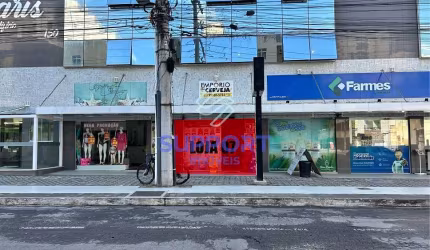Loja comercial na Praia do Morro com 1 vaga, quadra do mar e vista para o mar