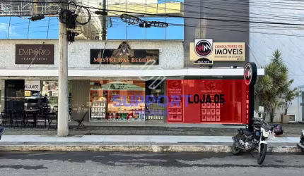 Loja comercial na Praia do Morro com 1 vaga, quadra do mar e vista para o mar