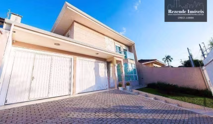 Casa com quatro quartos à venda no Bairro Portão.