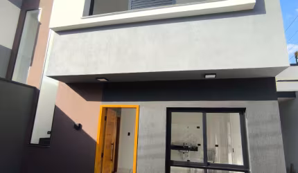 CASA FRONTAL COM 2 VAGAS 2 SUÍTES
