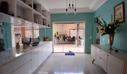Casa para Venda em Uberlândia, Santa Mônica, 3 dormitórios, 1 suíte, 2 banheiros, 3 vagas