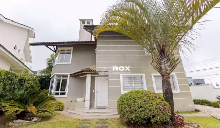 Casa em condomínio fechado com 3 suítes e piscina à venda, 290 m² por R$ 2.248.900 - São Lourenço - Curitiba/PR