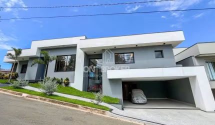 Casa com 3 dormitórios à venda, 357 m² por R$ 3.100.000,00 - Condomínio Portal do Jequitibá - Valinhos/SP