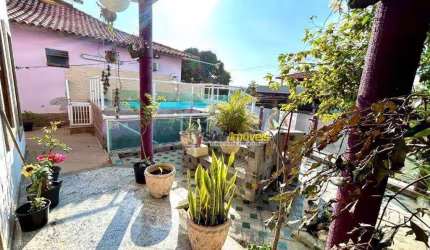 Casa com 4 dormitórios à venda, 315 m² por R$ 1.100.000,00 - Glória - Macaé/RJ