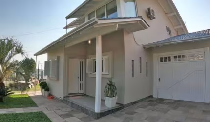 Casa com 4 dormitórios à venda, 173 m² por R$ 1.300.000,00 - Nova Vicenza - Farroupilha/RS